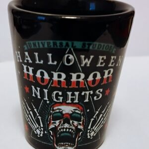 Universal Studios Halloween Horror Nights Shot glass Never Go Alone 2023